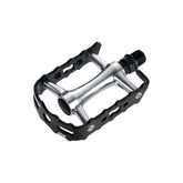 System EX M500 silver and black aluminium bike pedals with CNC CroMo spindles, showcasing durable cycling component design.