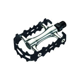 System EX M700 silver and black bike pedals with CNC CroMo spindles and reflectors, designed for durable cycling performance.