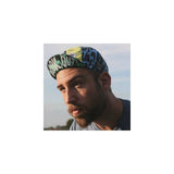 Cinelli High Flyer cycling cap with classic Italian design, lightweight headwear suitable for helmets and casual wear.