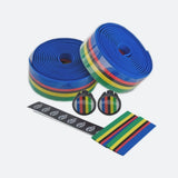 Cinelli World Champion rainbow-colored bar tape with deluxe plugs for road bike handlebars.