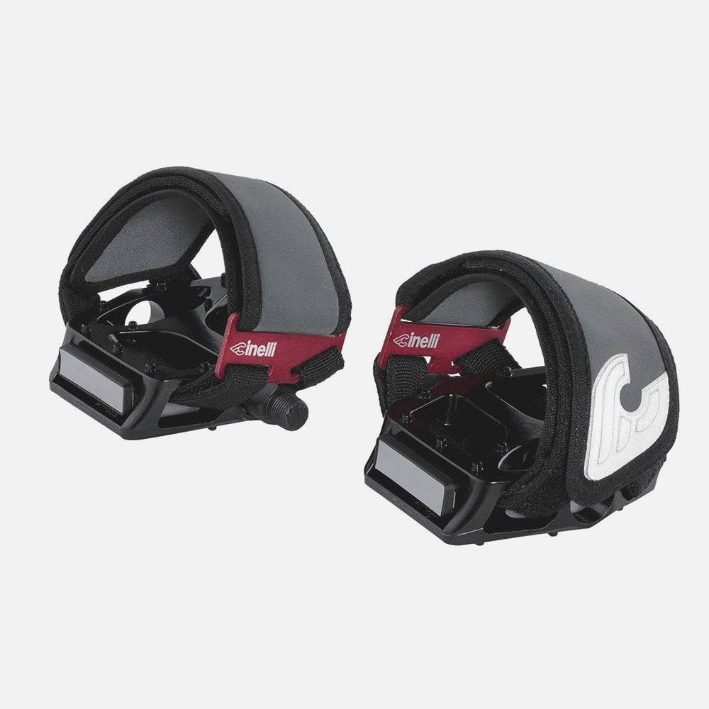 Cinelli Kink Toe Straps with reflective buckles, bike components for secure pedal fit, featuring adjustable straps and durable materials.