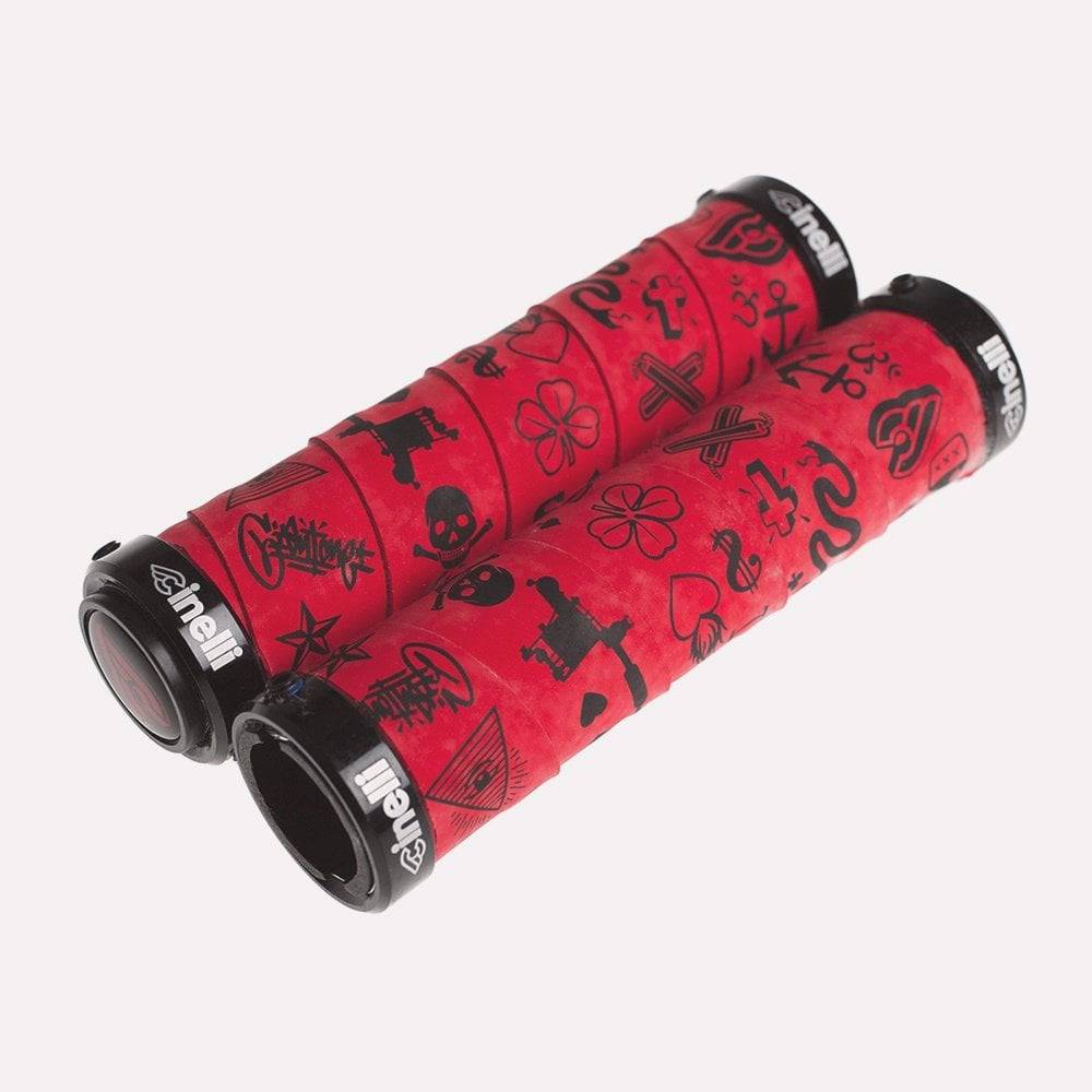 Cinelli Mike Giant Art Bike grips with velvet ribbon and anodized aluminum rings, showcasing unique design and vibrant details.