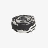 Cinelli Macro Splash Cork Bar Tape with chrome end plugs for road bike handlebars, featuring colorful splash design and durable grip.