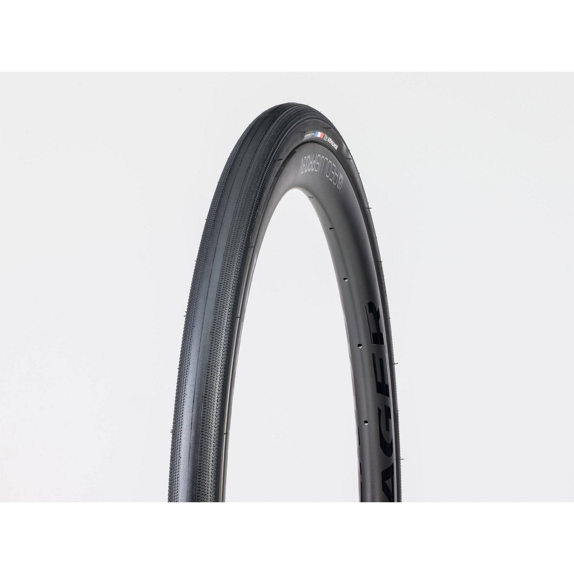 Bontrager R2 Hard-Case Lite road tire with puncture protection and fast rolling design, mounted on a bicycle wheel.