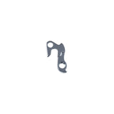 Trek derailleur hanger replacement component for precise bike shifting, shown on a bike wheel assembly.