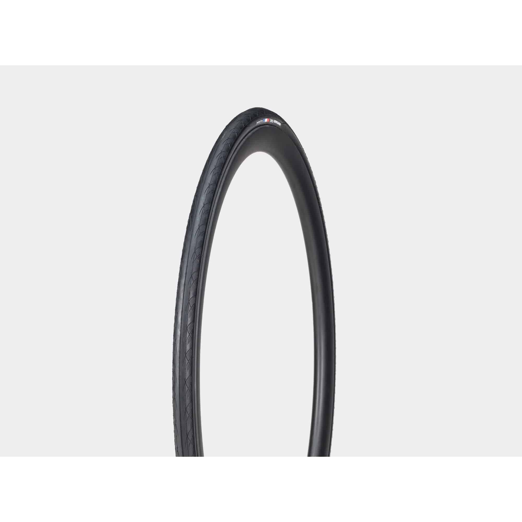 Bontrager AW1 Hard-Case Road Tire with Triple Flat Protection, showcasing durable rubber and tread pattern for cycling performance.