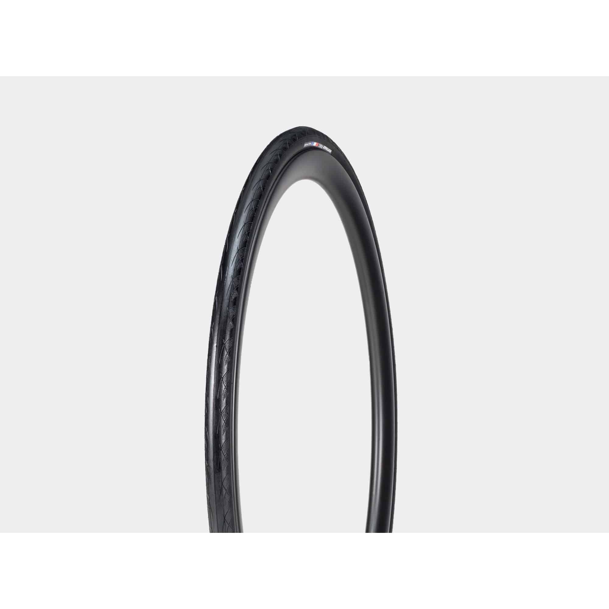 Bontrager AW1 Hard-Case Road Tire with Triple Flat Protection, featuring durable rubber and sleek tread for speed and reliability.