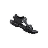 Shimano SD5 unisex SPD MTB shoes with black and gray design, featuring sturdy construction for efficient power transfer.