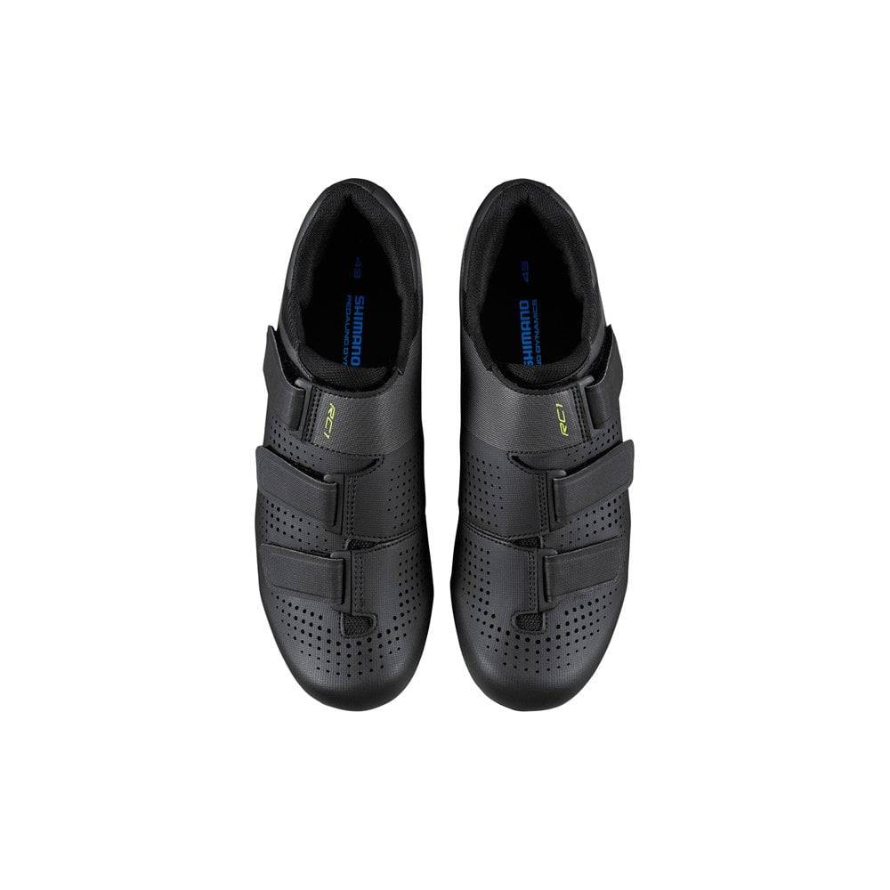 Shimano RC1 SPD-SL road cycling shoes with reflective straps, lightweight breathable design, and secure closure.