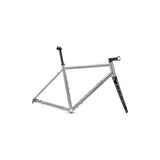 Genesis Croix De Fer titanium gravel frameset with carbon fork and disc brake mounts, highlighting lightweight bike component.