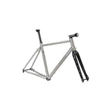 Genesis Croix De Fer Titanium gravel frameset with carbon fork and disc brake mounts, featuring durable construction and sleek design.