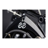 Cane Creek eeBrake road bike brake components with superior modulation and control, shown on a bicycle wheel.