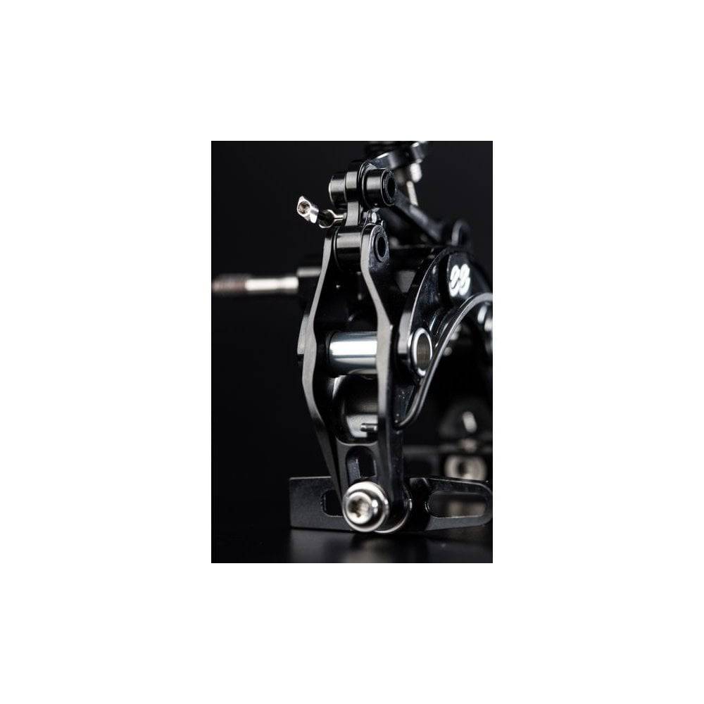 Cane Creek eeBrake road bike brake components with superior modulation and control, shown mounted on a bike wheel.