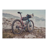 Brooks Scape waterproof bike frame bag in mud green, 3L capacity, designed for cycling adventures and bike accessory storage.