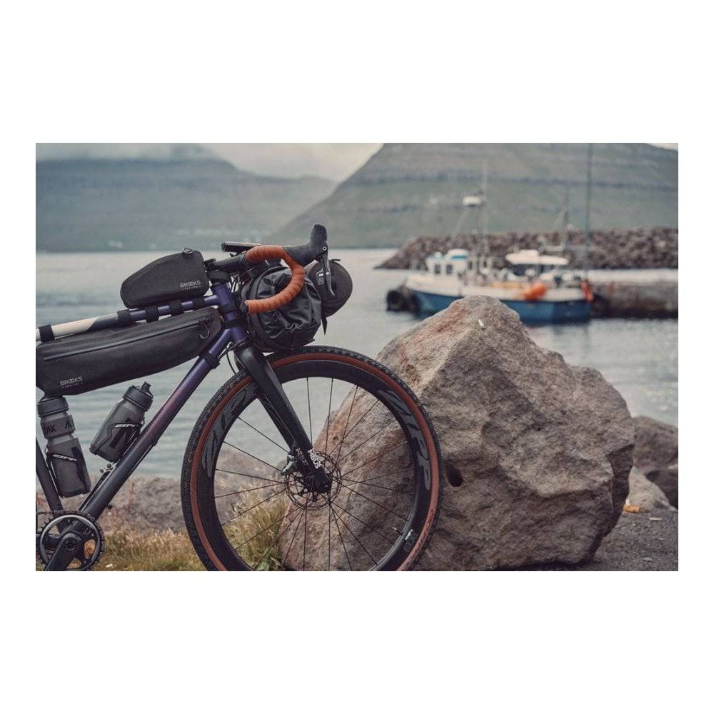 Brooks Scape waterproof bike frame bag in mud green, 3L capacity, designed for cycling adventures and bike accessories.