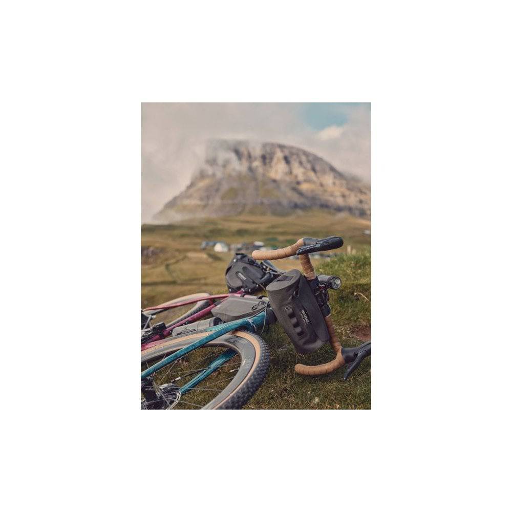 Brooks Scape waterproof handlebar pouch in mud green, bike storage accessory with secure zipper and durable waterproof material.