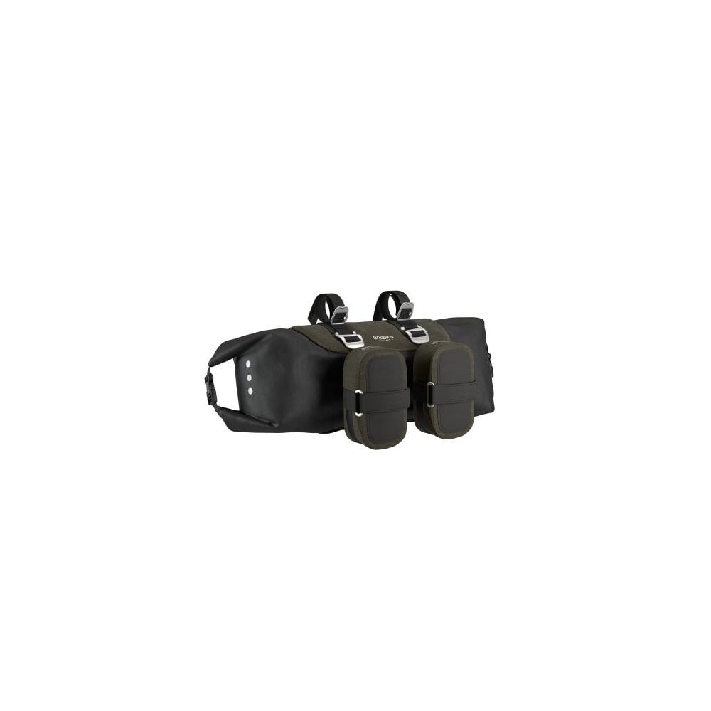 Brooks Scape handlebar roll bag in mud green, waterproof bikepacking gear with adjustable straps on a bike handlebar.