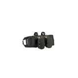 Brooks Scape handlebar roll bag in mud green, waterproof bikepacking gear with adjustable straps on a bike handlebar.