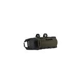 Brooks Scape Handlebar Roll Bag in muddy green waterproof bikepacking gear accessory mounted on a bicycle handlebar