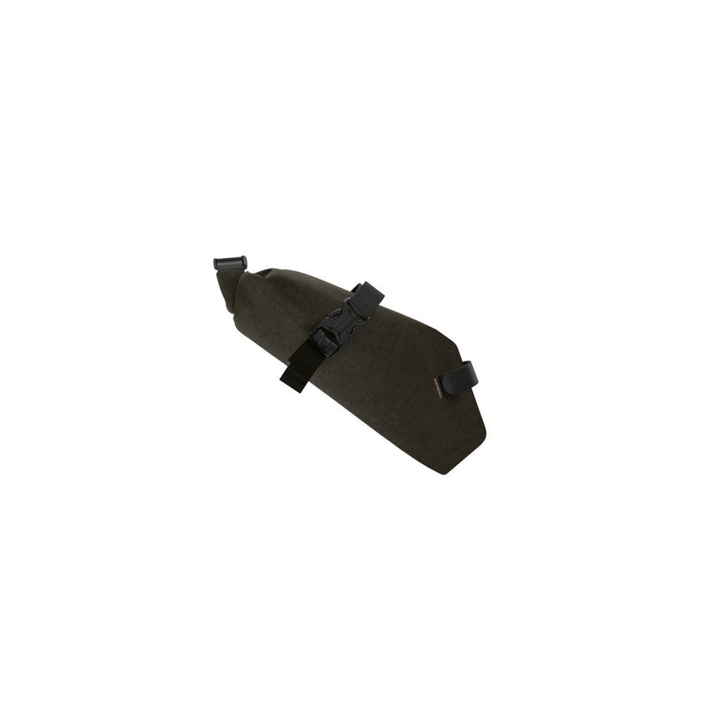 Brooks Scape Saddle Roll Bag in mud green, waterproof bikepacking accessory attached to a bicycle saddle for gear storage.