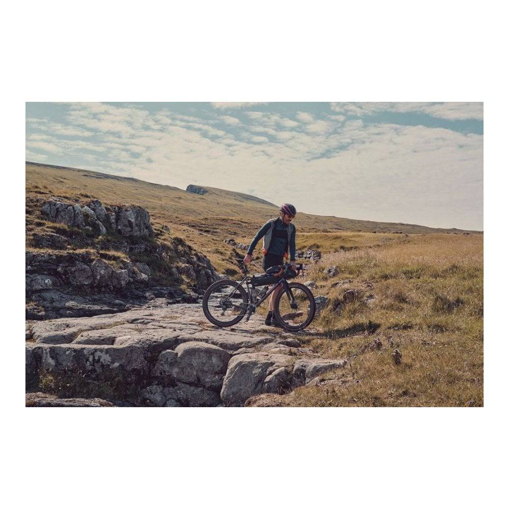 Brooks Scape waterproof top tube bag in mud green with reflective details, designed for bike accessories.