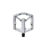 Crank Brothers Stamp 2 flat MTB pedal with adjustable pins, durable aluminum body, ideal for trail riding and mountain biking.