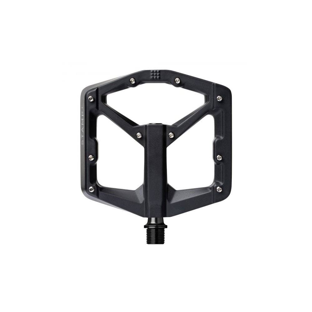 Crank Brothers Stamp 3 flat bike pedal with adjustable pins, black metal body, and textured grip surface for mountain biking.