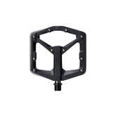 Crank Brothers Stamp 3 flat bike pedal with adjustable pins, black metal body, and textured grip surface for mountain biking.