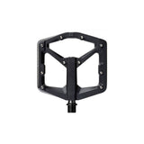 Crank Brothers Stamp 3 flat bike pedal with adjustable pins, black metal body, and textured grip surface for mountain biking.
