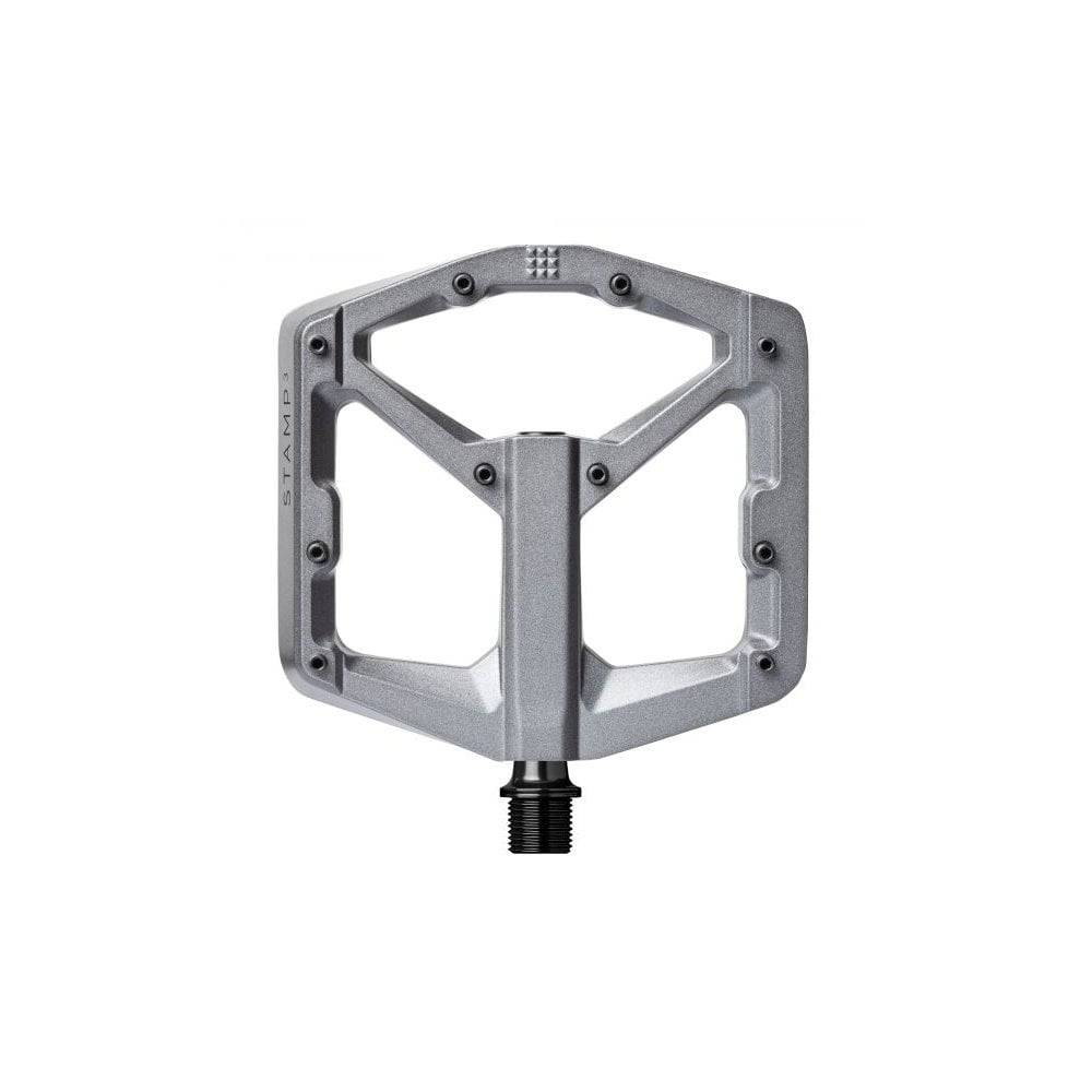 Crank Brothers Stamp 3 flat pedal with adjustable pins, durable metal body, and textured grip for mountain biking and cycling.
