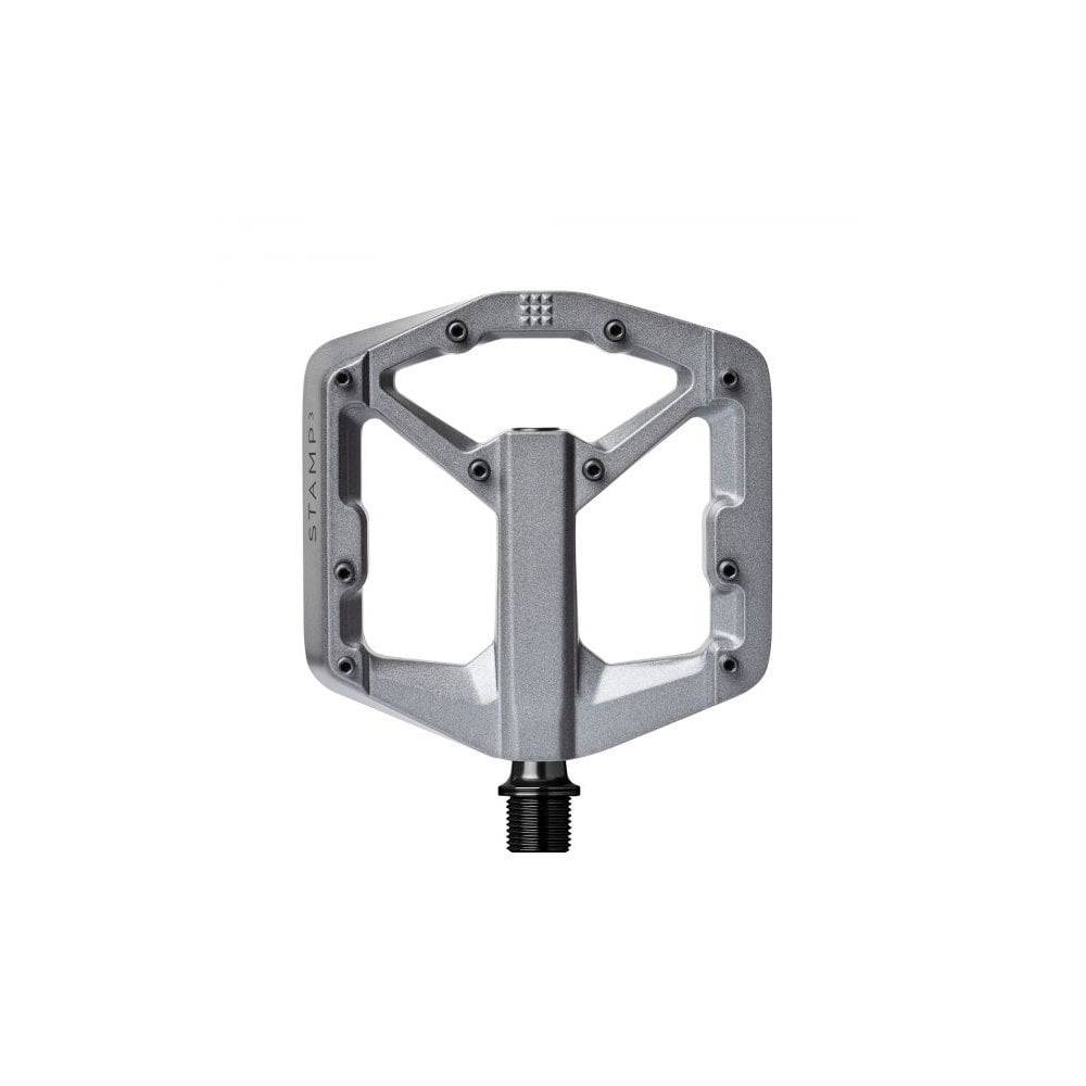 Crank Brothers Stamp 3 flat pedal with adjustable pins for enhanced grip, designed for mountain biking and cycling components.