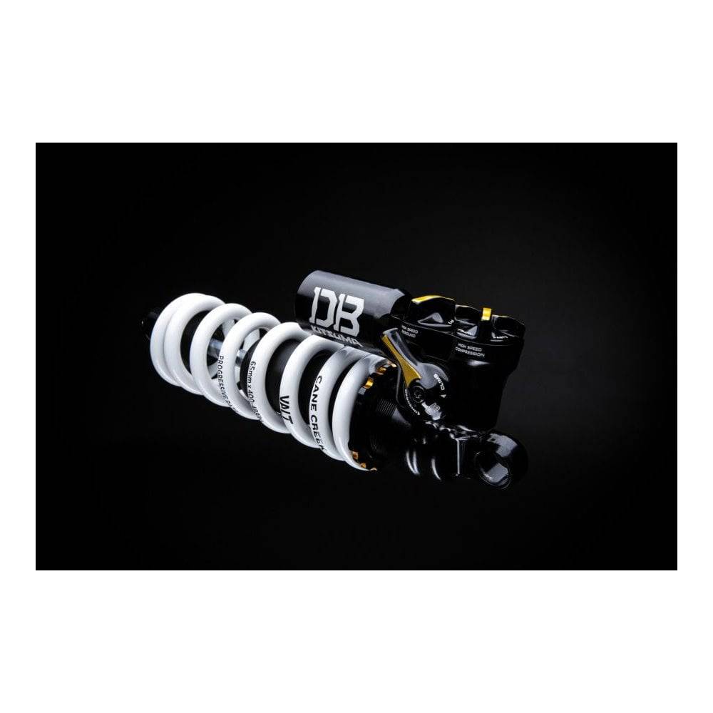 Cane Creek Kitsuma Coil rear shock with tool-free adjustment and 3-position climb switch for mountain bike suspension.