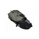 Topeak BackLoader bikepacking seat bag with water-resistant fabric and quick-release mount attached to a bicycle seat.