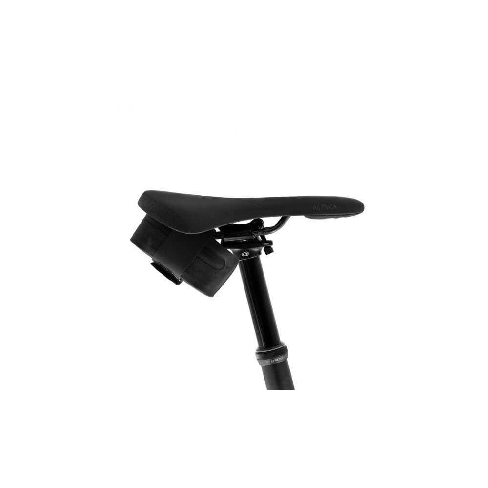 Fizik waterproof cycling saddle bag with Velcro attachment, compact storage accessory for bike seats.