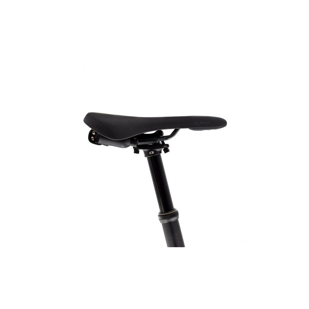 Fizik Terra Alpaca X5 MTB saddle with Mobius S-Alloy rails, black 145mm, shown with included tool kit for mountain biking components.
