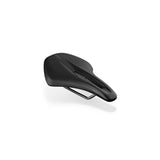 Fizik Terra Argo X3 gravel bike saddle with short-nose design and cut-out for comfort, mounted on a bike seat post