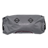 Passport waterproof handlebar pack with LED light mounts, bicycle accessory designed for secure storage during rides.