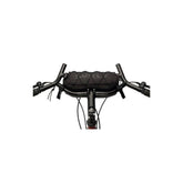 Surly Moloko handlebar bag for bikes, mounted on bike handlebar, with zipper closure and durable fabric for cycling accessories.
