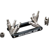 Schwalbe workshop multi tool with hex keys, Torx T25, screwdriver, and valve tool for bike repairs.