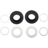 Problem Solvers BB30 adaptor spares and accessories for mountain bike crank compatibility, showing various small component parts.