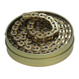 Gusset Components Bling Slink 1/2 x 3/32" single-speed chain with gold finish, showing the shiny gold metal links.