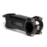 Redshift Sports ShockStop suspension stem with adjustable elastomers for road bikes, showing the sleek red component and mounting hardware.