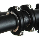 Genetic handlebar shims for split-clamp stems, showing close-up of black plastic spacers designed for bike component fitting.