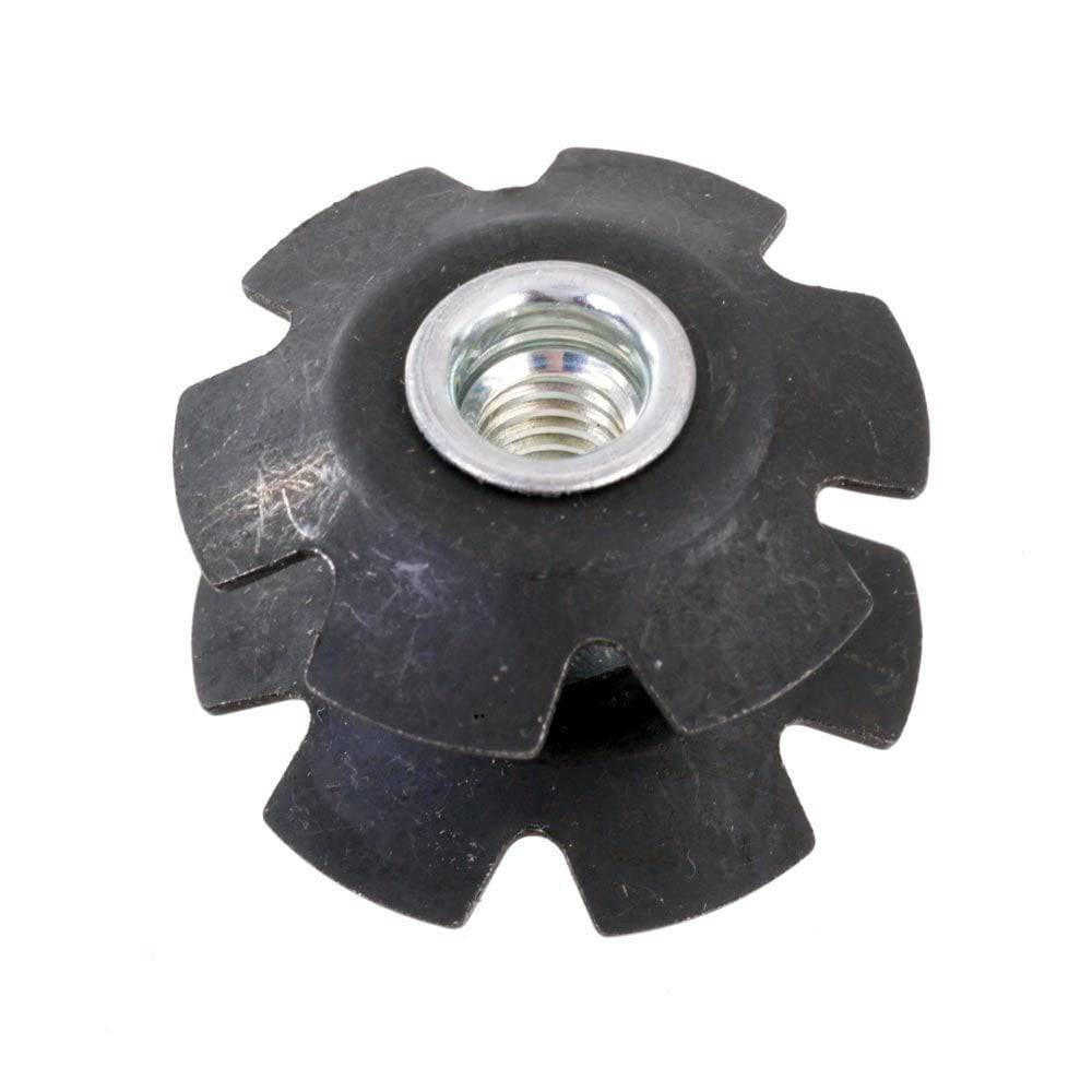 Dia-Compe Ahead Starnut for threadless headset systems, steel and alloy steerers, close-up of the component for bike steering parts.