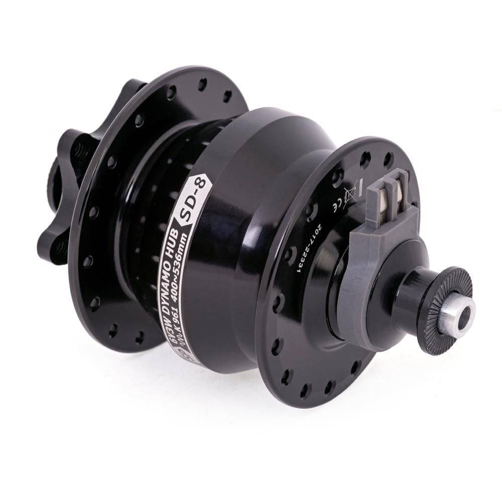 SP SD-8 small bike dynamo hub with disc mount, 6V 3W output for bike lights, shown installed on bicycle wheel.