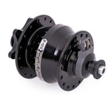 SP SD-8 small bike dynamo hub with disc mount, 6V 3W output for bike lights, shown installed on bicycle wheel.