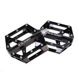 Gusset Components S2 flat bike pedal with grip pins and durable platform, designed for secure cycling performance.