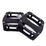Gusset Components Slim Jim flat pedal with replaceable pins and Cr-Mo axle, designed for mountain biking and BMX riding.