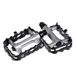 Genetic Pro MTB SB flat pedal for cross-country riding with sealed bearings, featuring durable metal construction and textured grip surfaces.