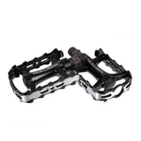Genetic Drift flat cycling pedal with durable aluminum body, ideal for urban and trekking bikes, showcasing a sturdy component.